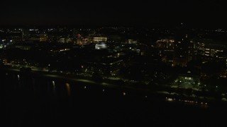 5.5K aerial stock footage flying by MIT campus, Massachusetts Institute of Technology, Cambridge, Massachusetts, night Aerial Stock Footage | AX141_156E