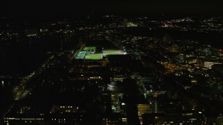 5.5K aerial stock footage approaching Maclaurin Building, sports fields, Massachusetts Institute of Technology, Cambridge, Massachusetts, night Aerial Stock Footage | AX141_168E