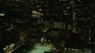 AX141_172E - 5.5K aerial stock footage flying by Beth Israel Hospital, Longwood Medical Area, Boston, Massachusetts, night