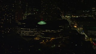 5.5K aerial stock footage flying by Copley Place shopping mall, Downtown Boston, Massachusetts, night Aerial Stock Footage | AX141_189E