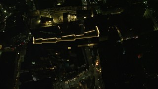 5.5K aerial stock footage flying by the Millennium Tower, Downtown Boston, Massachusetts, night Aerial Stock Footage | AX141_216E