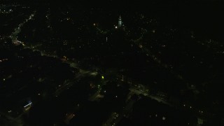 5.5K aerial stock footage flying by Broadway, Dorchester Heights Monument, South Boston, Massachusetts, night Aerial Stock Footage | AX141_219E