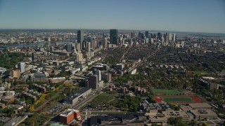 5.5K aerial stock footage flying over Roxbury in autumn, approaching Downtown Boston, Massachusetts Aerial Stock Footage | AX142_016E