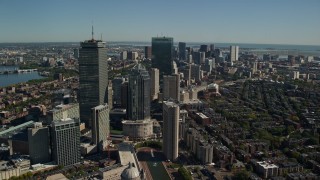 5.5K aerial stock footage flying over buildings in autumn, approaching Downtown Boston, Massachusetts Aerial Stock Footage | AX142_019E