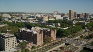 AX142_058E - 5.5K aerial stock footage flying over Charles River, approaching Harvard Bridge, MIT, Cambridge, Massachusetts