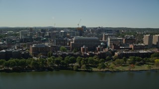 AX142_074 - 5.5K aerial stock footage fying over Charles River, by Boston University, Boston, Massachusetts