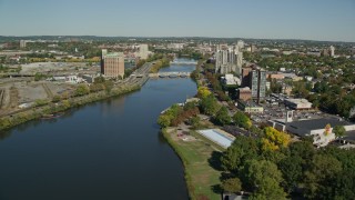 AX142_075E - 5.5K aerial stock footage flying over Charles River and Boston University Bridge, Boston, Massachusetts