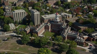 AX142_094E - 5.5K aerial stock footage orbiting Harvard University, Dunster House, Cambridge, Massachusetts