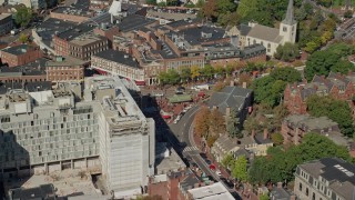 AX142_108E - 5.5K aerial stock footage orbiting Harvard University, Harvard Square, Cambridge,  Massachusetts