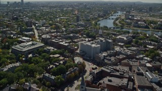 AX142_113E - 5.5K aerial stock footage orbiting Harvard University, revealing Charles River, Cambridge, Massachusetts