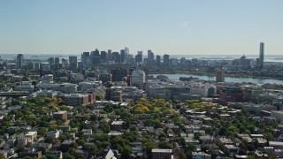 AX142_124E - 5.5K aerial stock footage flying over Cambridge and by Downtown Boston, Massachusetts