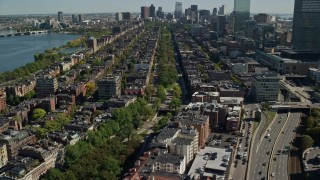 AX142_163E - 5.5K aerial stock footage of Victorian brownstones, Boston Common, Back Bay, Downtown Boston, Massachusetts