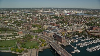 5.5K aerial stock footage flying over TD Garden, Zakim Bridge, Charlestown Bridge, Charlestown, Massachusetts Aerial Stock Footage | AX142_177E