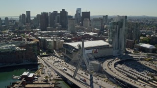 AX142_197E - 5.5K aerial stock footage flying over Zakim Bridge, approach TD Garden, Downtown Boston, Massachusetts