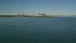 5.5K aerial stock footage fly over Spectacle Island toward Fort Independence, Boston Harbor and Downtown Boston, Massachusetts Aerial Stock Footage | AX142_283E