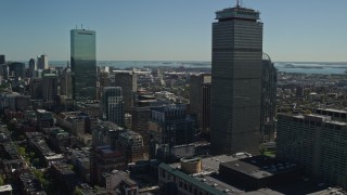 5.5K aerial stock footage flying by Prudential Tower, buildings, Downtown Boston, Massachusetts Aerial Stock Footage | AX142_306E