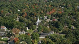 5.5K aerial stock footage flying over small town, trees, approach church, autumn, Hingham, Massachusetts Aerial Stock Footage | AX143_017E