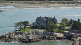 5.5K aerial stock footage flying by isolated upscale oceanfront home, Cohasset, Massachusetts Aerial Stock Footage | AX143_029