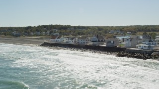 5.5K aerial stock footage flying by oceanfront homes, pan right, Scituate, Massachusetts Aerial Stock Footage | AX143_033