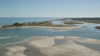 AX143_047E - 5.5K aerial stock footage approaching coastal homes, New Inlet, Humarock, Massachusetts