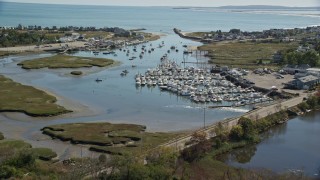 5.5K aerial stock footage flying over small town, approaching marina, autumn, Marshfield, Massachusetts Aerial Stock Footage | AX143_060E