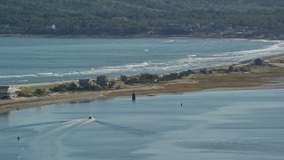 5.5K aerial stock footage flying by beach, oceanfront homes, Plymouth, Massachusetts Aerial Stock Footage | AX143_085