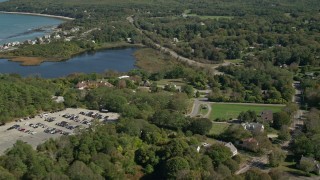 5.5K aerial stock footage flying over small town, church, flyby Plimoth Plantation, Plymouth, Massachusetts Aerial Stock Footage | AX143_103E