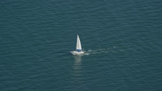 5.5K aerial stock footage tracking a sailing boat on Cape Cod Bay, Massachusetts Aerial Stock Footage | AX143_125