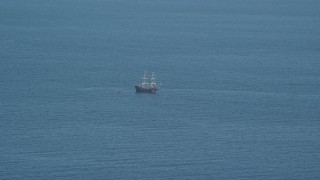 AX143_129E - 5.5K aerial stock footage flying by historic sailing ship, Cape Cod Bay, Massachusetts