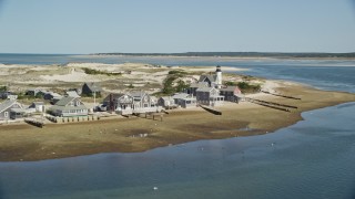 AX143_143E - 5.5K aerial stock footage of Sandy Neck Colony, Sandy Neck Light, Cape Cod, Barnstable, Massachusetts