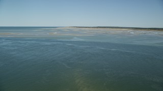 5.5K aerial stock footage approaching sand bars, low tide, Cape Cod Bay, Massachusetts Aerial Stock Footage | AX143_146