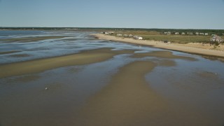 5.5K aerial stock footage flying over sand bar, by beachfront homes, Cape Cod, Eastham, Massachusetts Aerial Stock Footage | AX143_188