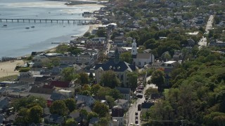 AX143_229E - 5.5K aerial stock footage of Provincetown Town Hall, Unitarian Universalist Meeting House, Provincetown, Massachusetts