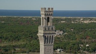 5.5K aerial stock footage orbiting the top of the Pilgrim Monument, Provincetown, Massachusetts Aerial Stock Footage | AX143_250