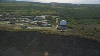 AX144_016 - 5.5K aerial stock footage flying by North Truro Air Force Station, Cape Cod, Truro, Massachusetts