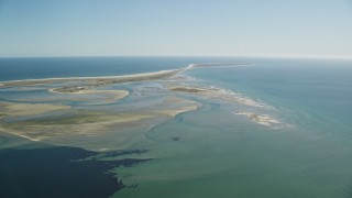 5.5K aerial stock footage flying by sand bars at low tide and Monomoy Island, Massachusetts Aerial Stock Footage | AX144_056E