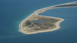 5.5K aerial stock footage flying by Great Point Light, island, Nantucket, Massachusetts Aerial Stock Footage | AX144_067