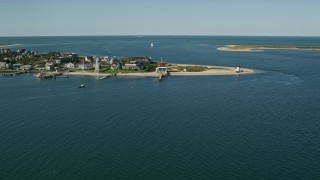 5.5K aerial stock footage of oceanfront property, Nantucket Harbor Range Lights, Nantucket, Massachusetts Aerial Stock Footage | AX144_081