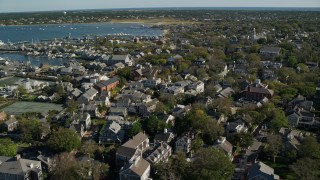 5.5K aerial stock footage flying by small island town, coastal community, Nantucket, Massachusetts Aerial Stock Footage | AX144_093E