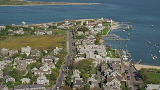 AX144_103 - 5.5K aerial stock footage of a coastal community, Nantucket Harbor Range Lights, Nantucket, Massachusetts