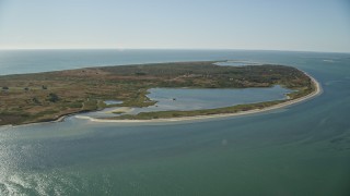 AX144_115E - 5.5K aerial stock footage flying over the ocean approaching Tuckernuck Island, Nantucket, Massachusetts