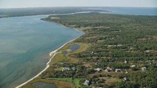 5.5K aerial stock footage of homes near Katama Bay, Chappaquiddick Island, Martha's Vineyard, Massachusetts Aerial Stock Footage | AX144_126E