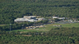 AX144_151 - 5.5K aerial stock footage of Martha's Vineyard Regional High School, Edgartown, Martha's Vineyard, Massachusetts