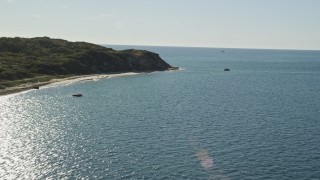 AX144_162E - 5.5K aerial stock footage approaching beachfront homes, beach, Aquinnah, Martha's Vineyard, Massachusetts