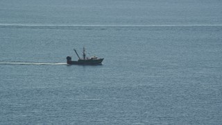 5.5K aerial stock footage tracking a fishing boat on the Atlantic Ocean Aerial Stock Footage | AX144_167