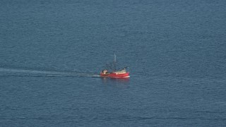 6k aerial stock footage tracking a fishing boat on the Atlantic Ocean Aerial Stock Footage | AX144_181E