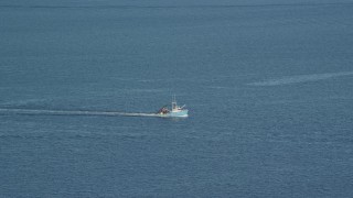 6k aerial stock footage tracking a fishing boat on the Atlantic Ocean Aerial Stock Footage | AX144_184