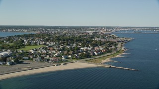 6k aerial stock footage flying by coastal community, factory, New Bedford, Massachusetts Aerial Stock Footage | AX144_187E