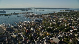 6k aerial stock footage orbiting coastal community, Newport Harbor, Newport, Rhode Island Aerial Stock Footage | AX144_234E