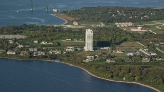 6k aerial stock footage flying by upscale waterfront homes, condominium complex, Portsmouth, Rhode Island Aerial Stock Footage | AX145_008